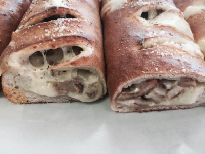 STROMBOLI & CALZONES Image