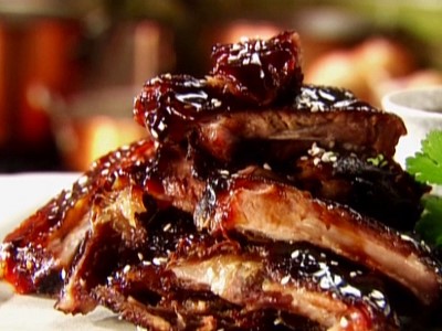 1/2 Rack Ribs (includes 1 - 8 oz sides, 1 roll or 1 Pc cornbread and sauce) Image