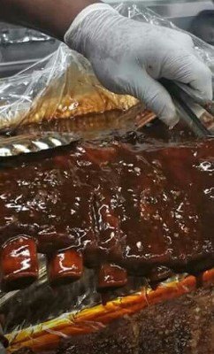 Full Rack Ribs (includes 2 - 8 oz sides, 2 roll or 2 Pcs cornbread and sauce) Image