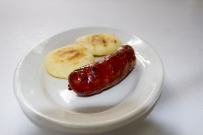 6. CHORIZO CON AREPITAS Image