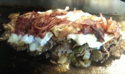 Ultimate Steak & Cheese Sub Half Image