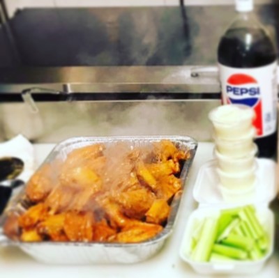 (50) Buffalo Wings & 2-Liter Image