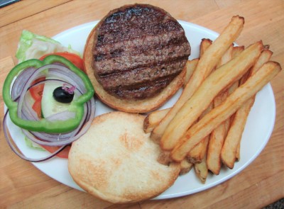Burger with Lettuce, Tomato, Onion, & Idaho Fries Image