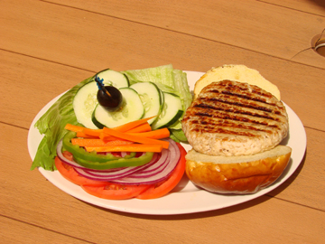 Turkey Burger with Lettuce, Tomato, Onion, & Garni Image