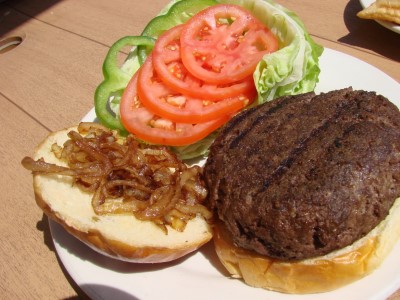 Burger with Lettuce, Tomato, & Onion Image