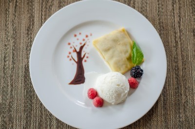 Warm Banana Crepes with Vanilla Ice Cream Image
