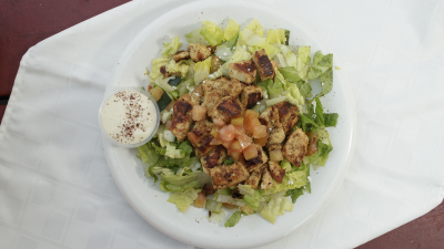 Grilled Chicken Shish Kebab over Salad Image