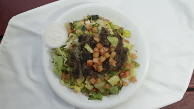 Grilled Beef Kafta over Salad Image