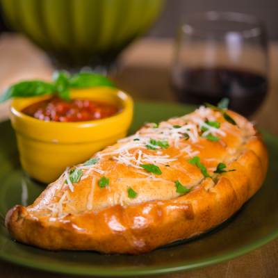 STROMBOLIS & CALZONES Image