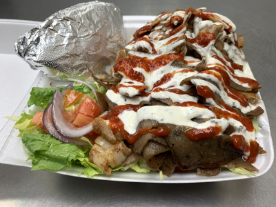 Chicken & Beef Combo on Salad Image
